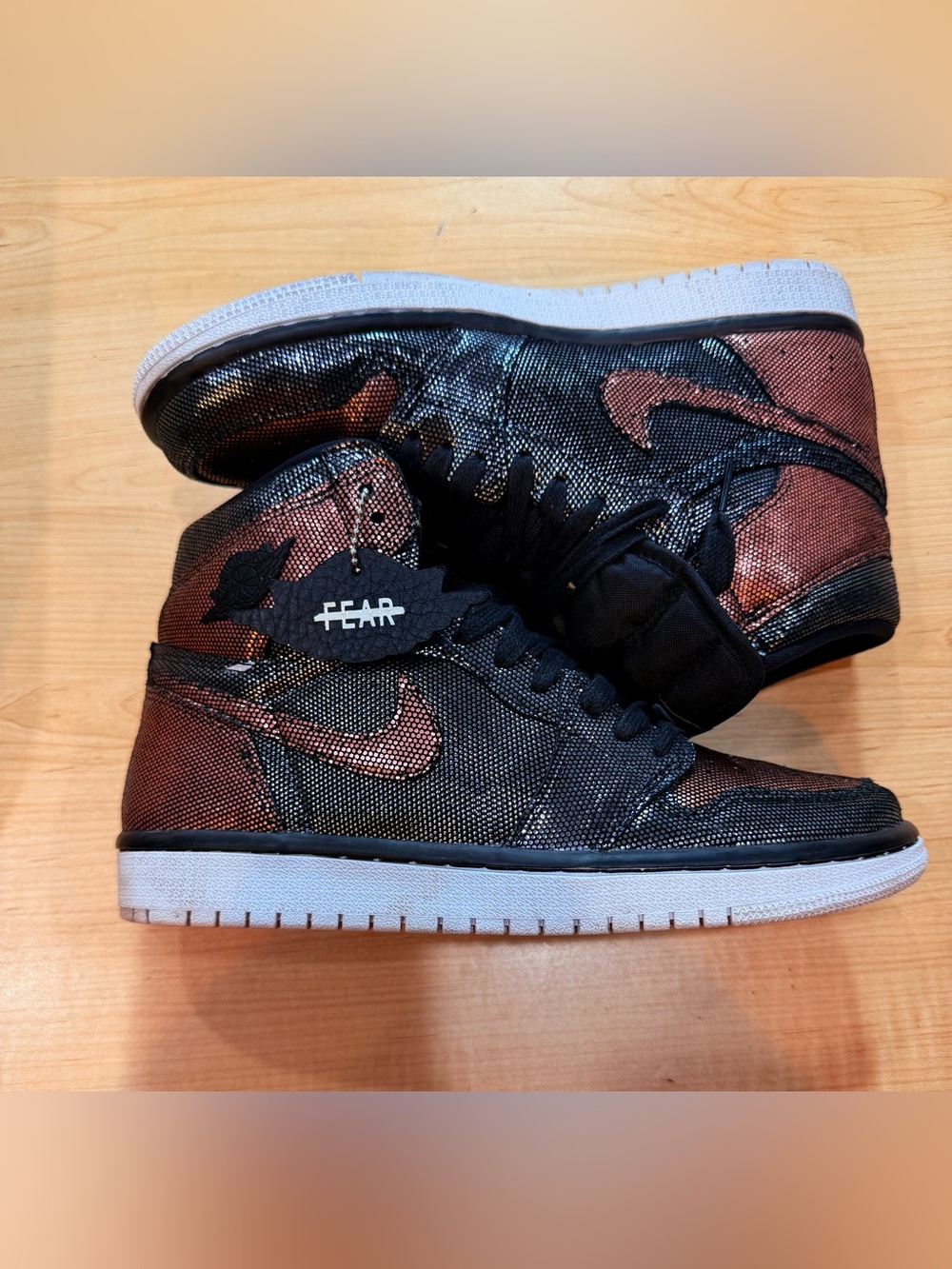 Nike Air Jordan 1 Mid in Black and Copper